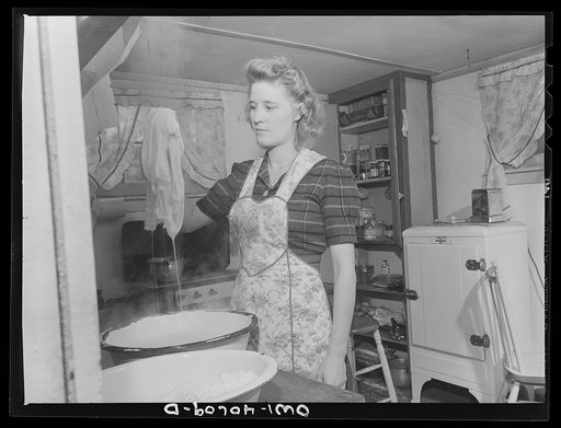 Washington, D.C. Every morning, Lynn Massman, wife of a second class petty officer who is studying in Washington, must wash clothes and diapers for her eight-weeks-old son