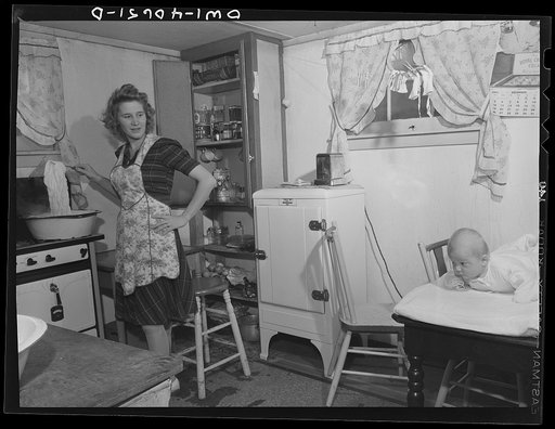 Washington, D.C. Lynn Massman, wife of a second class petty officer who is  studying in Washington, does the washing every morning