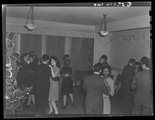 Untitled photo, possibly related to: Washington, D.C. Decorating the tree at a Christmas Eve party given by Local 203 of the United Federal Workers of America, Congress of Industrial Organizations (CIO)