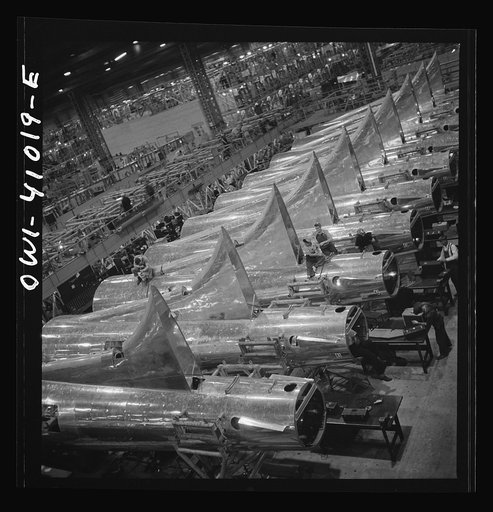 Untitled photo, possibly related to: Boeing aircraft plant, Seattle, Washington. Production of B-17F (Flying Fortress) bombing planes. Tail section of B-17F (Flying Fortress) bombers
