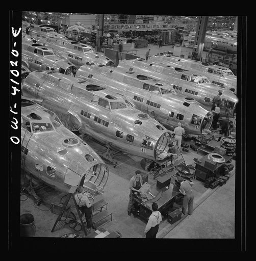 Boeing aircraft plant, Seattle, Washington. Production of B-17F (Flying Fortress) bombing planes. Fuselage sections