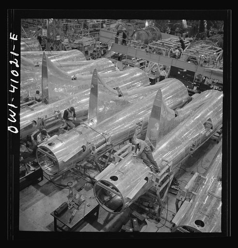 Untitled photo, possibly related to: Boeing aircraft plant, Seattle, Washington. Production of B-17F (Flying Fortress) bombing planes. Tail section of B-17F (Flying Fortress) bombers
