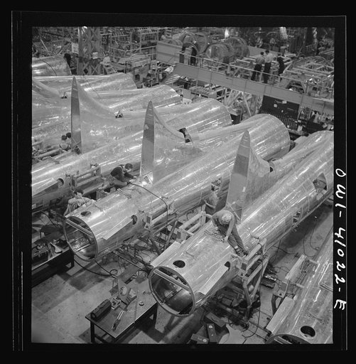 Untitled photo, possibly related to: Boeing aircraft plant, Seattle, Washington. Production of B-17F (Flying Fortress) bombing planes. Tail section of B-17F (Flying Fortress) bombers