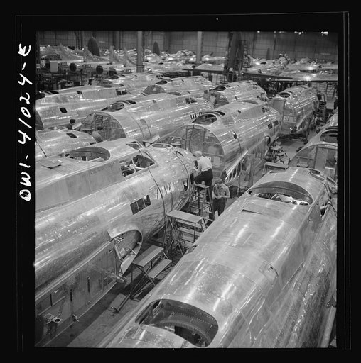 Untitled photo, possibly related to: Boeing aircraft plant, Seattle, Washington. Production of B-17F (Flying Fortress) bombing planes. Fuselage sections
