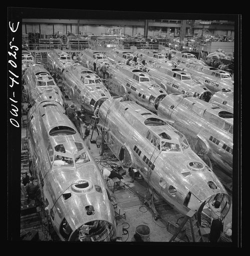 Untitled photo, possibly related to: Boeing aircraft plant, Seattle, Washington. Production of B-17F (Flying Fortress) bombing planes. Fuselage sections