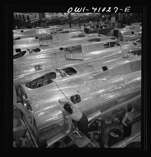 Boeing aircraft plant, Seattle, Washington. Production of B-17F (Flying Fortress) bombing planes. Fuselage sections
