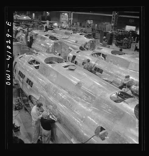 Boeing aircraft plant, Seattle, Washington. Production of B-17F (Flying Fortress) bombing planes. Fuselage sections
