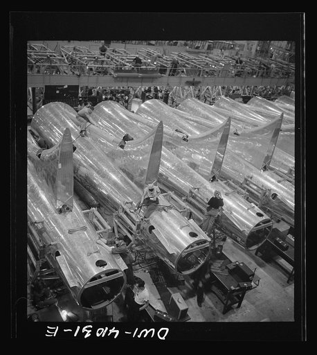 Untitled photo, possibly related to: Boeing aircraft plant, Seattle, Washington. Production of B-17F (Flying Fortress) bombing planes. Tail section of B-17F (Flying Fortress) bombers