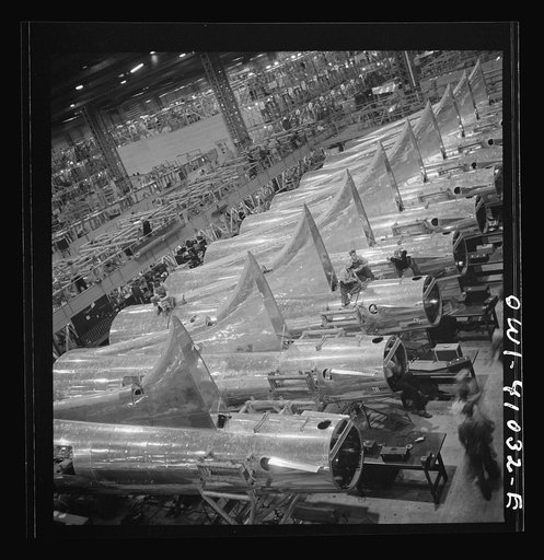 Untitled photo, possibly related to: Boeing aircraft plant, Seattle, Washington. Production of B-17F (Flying Fortress) bombing planes. Tail section of B-17F (Flying Fortress) bombers