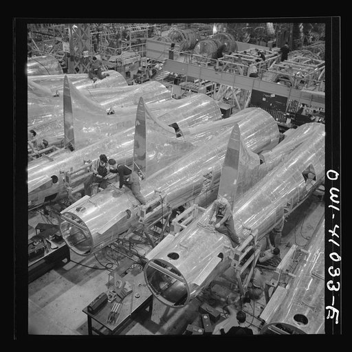 Untitled photo, possibly related to: Boeing aircraft plant, Seattle, Washington. Production of B-17F (Flying Fortress) bombing planes. Tail section of B-17F (Flying Fortress) bombers