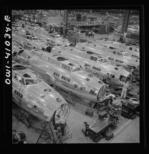 Untitled photo, possibly related to: Boeing aircraft plant, Seattle, Washington. Production of B-17F (Flying Fortress) bombing planes. Fuselage sections