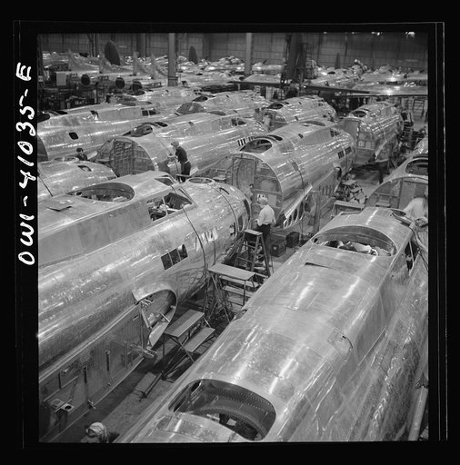 Untitled photo, possibly related to: Boeing aircraft plant, Seattle, Washington. Production of B-17F (Flying Fortress) bombing planes. Fuselage sections