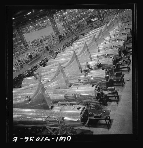 Untitled photo, possibly related to: Boeing aircraft plant, Seattle, Washington. Production of B-17F (Flying Fortress) bombing planes. Tail section of B-17F (Flying Fortress) bombers