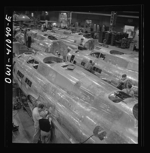 Untitled photo, possibly related to: Boeing aircraft plant, Seattle, Washington. Production of B-17F (Flying Fortress) bombing planes. Fuselage sections