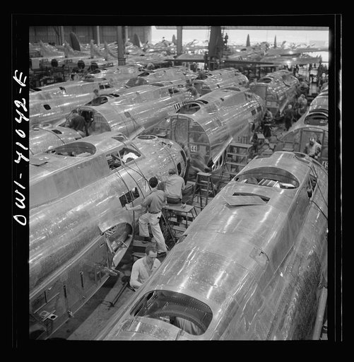 Boeing aircraft plant, Seattle, Washington. Production of B-17F (Flying Fortress) bombing planes. Fuselage sections