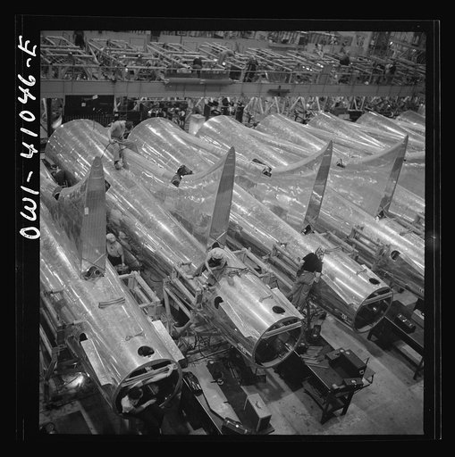 Untitled photo, possibly related to: Boeing aircraft plant, Seattle, Washington. Production of B-17F (Flying Fortress) bombing planes. Tail section of B-17F (Flying Fortress) bombers