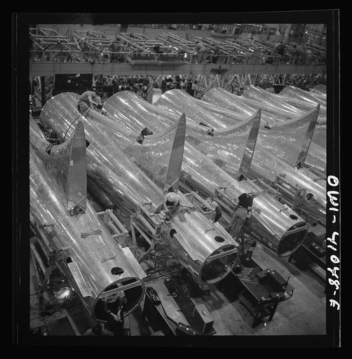 Untitled photo, possibly related to: Boeing aircraft plant, Seattle, Washington. Production of B-17F (Flying Fortress) bombing planes. Tail section of B-17F (Flying Fortress) bombers