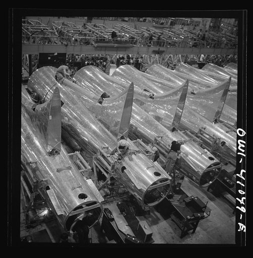 Boeing aircraft plant, Seattle, Washington. Production of B-17F (Flying Fortress) bombing planes. Tail section of B-17F (Flying Fortress) bombers