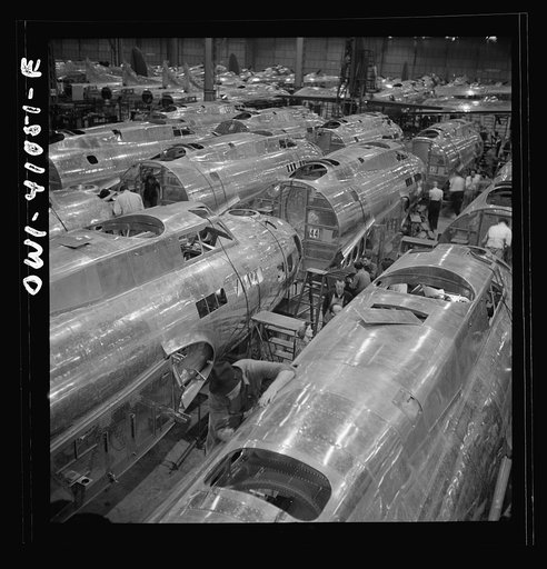 Untitled photo, possibly related to: Boeing aircraft plant, Seattle, Washington. Production of B-17F (Flying Fortress) bombing planes. Fuselage sections