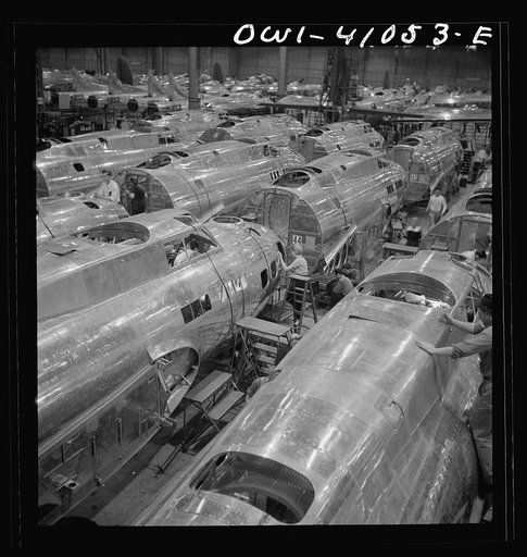 Untitled photo, possibly related to: Boeing aircraft plant, Seattle, Washington. Production of B-17F (Flying Fortress) bombing planes. Fuselage sections