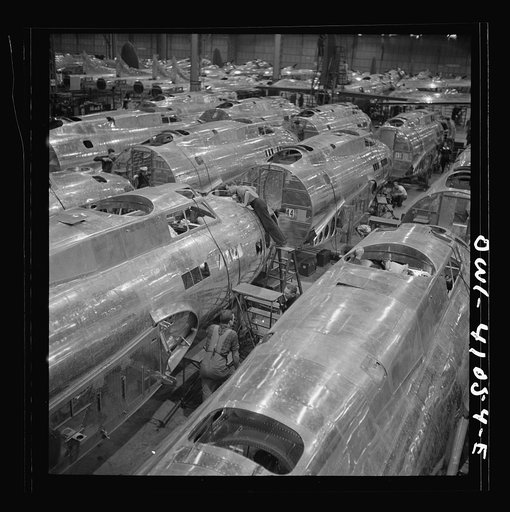Untitled photo, possibly related to: Boeing aircraft plant, Seattle, Washington. Production of B-17F (Flying Fortress) bombing planes. Fuselage sections