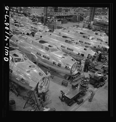 Untitled photo, possibly related to: Boeing aircraft plant, Seattle, Washington. Production of B-17F (Flying Fortress) bombing planes. Fuselage sections