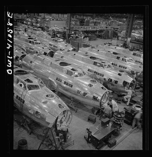 Untitled photo, possibly related to: Boeing aircraft plant, Seattle, Washington. Production of B-17F (Flying Fortress) bombing planes. Fuselage sections
