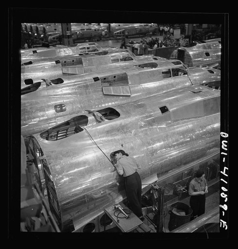 Untitled photo, possibly related to: Boeing aircraft plant, Seattle, Washington. Production of B-17F (Flying Fortress) bombing planes. Fuselage sections