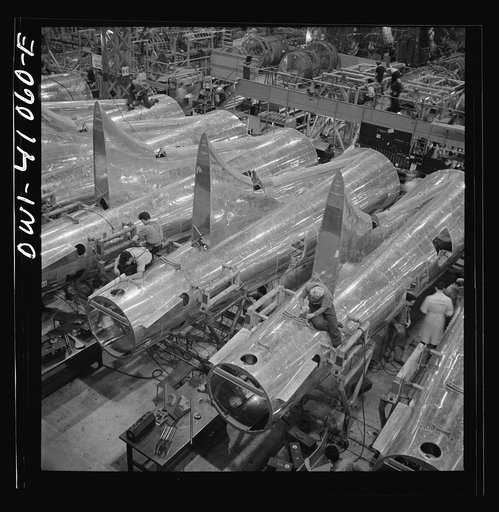 Untitled photo, possibly related to: Boeing aircraft plant, Seattle, Washington. Production of B-17F (Flying Fortress) bombing planes. Tail section of B-17F (Flying Fortress) bombers