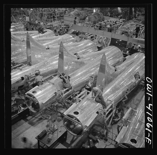 Untitled photo, possibly related to: Boeing aircraft plant, Seattle, Washington. Production of B-17F (Flying Fortress) bombing planes. Tail section of B-17F (Flying Fortress) bombers