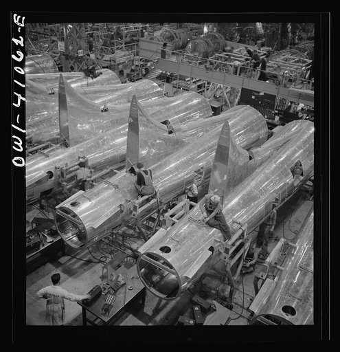Untitled photo, possibly related to: Boeing aircraft plant, Seattle, Washington. Production of B-17F (Flying Fortress) bombing planes. Tail section of B-17F (Flying Fortress) bombers