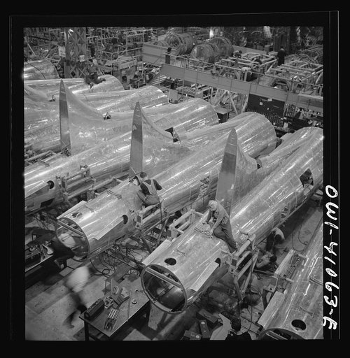 Untitled photo, possibly related to: Boeing aircraft plant, Seattle, Washington. Production of B-17F (Flying Fortress) bombing planes. Tail section of B-17F (Flying Fortress) bombers
