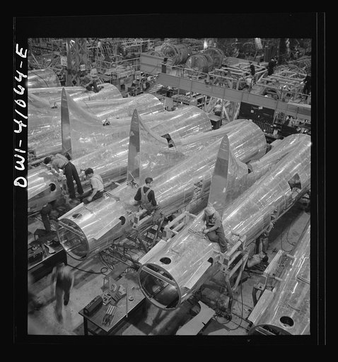 Untitled photo, possibly related to: Boeing aircraft plant, Seattle, Washington. Production of B-17F (Flying Fortress) bombing planes. Tail section of B-17F (Flying Fortress) bombers