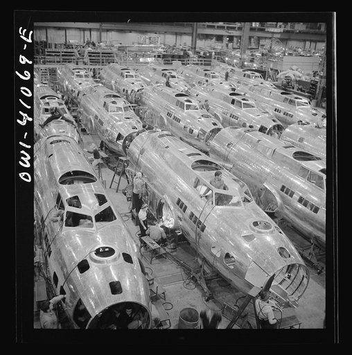 Untitled photo, possibly related to: Boeing aircraft plant, Seattle, Washington. Production of B-17F (Flying Fortress) bombing planes. Fuselage sections