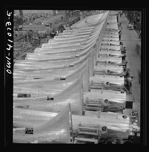 Untitled photo, possibly related to: Boeing aircraft plant, Seattle, Washington. Production of B-17F (Flying Fortress) bombing planes. Tail section of B-17F (Flying Fortress) bombers