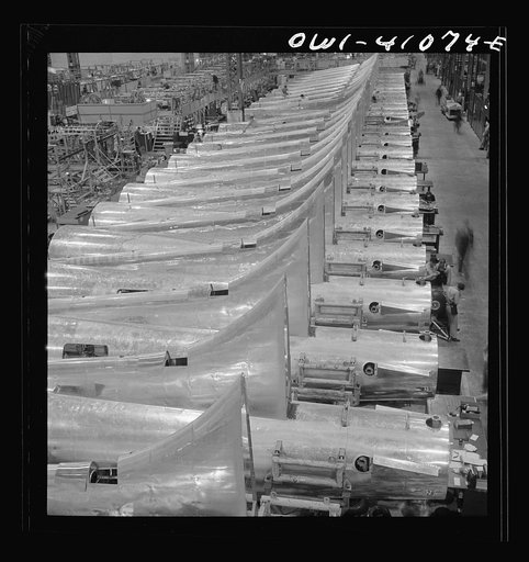 Untitled photo, possibly related to: Boeing aircraft plant, Seattle, Washington. Production of B-17F (Flying Fortress) bombing planes. Tail section of B-17F (Flying Fortress) bombers