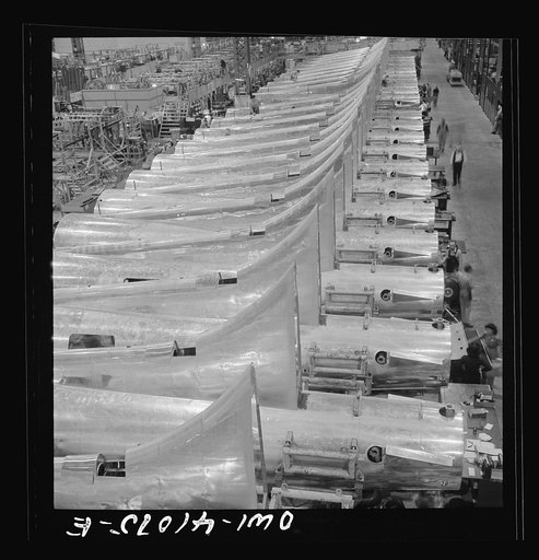 Untitled photo, possibly related to: Boeing aircraft plant, Seattle, Washington. Production of B-17F (Flying Fortress) bombing planes. Tail section of B-17F (Flying Fortress) bombers