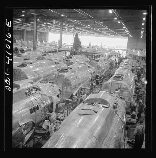 Untitled photo, possibly related to: Boeing aircraft plant, Seattle, Washington. Production of B-17F (Flying Fortress) bombing planes. Fuselage sections