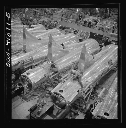 Boeing aircraft plant, Seattle, Washington. Production of B-17F (Flying Fortress) bombing planes. Tail section of B-17F (Flying Fortress) bombers