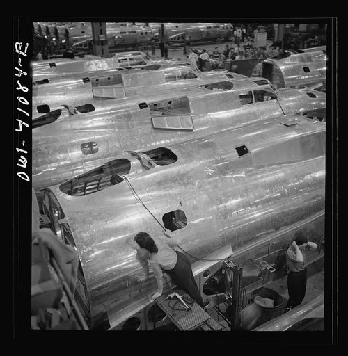 Untitled photo, possibly related to: Boeing aircraft plant, Seattle, Washington. Production of B-17F (Flying Fortress) bombing planes. Fuselage sections