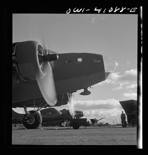 Untitled photo, possibly related to: Boeing aircraft plant, Seattle, Washington. Production of B-17F (Flying Fortress) bombing planes. The bombadier's compartment in the nose