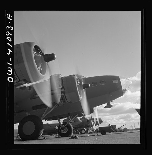 Untitled photo, possibly related to: Boeing aircraft plant, Seattle, Washington. Production of B-17F (Flying Fortress) bombing planes. The bombadier's compartment in the nose