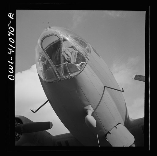 Untitled photo, possibly related to: Boeing aircraft plant, Seattle, Washington. Production of B-17F (Flying Fortress) bombing planes. The bombadier's compartment in the nose