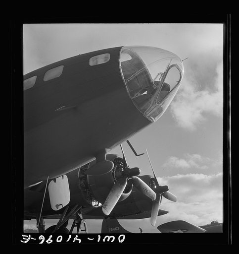 Untitled photo, possibly related to: Boeing aircraft plant, Seattle, Washington. Production of B-17F (Flying Fortress) bombing planes. The bombadier's compartment in the nose