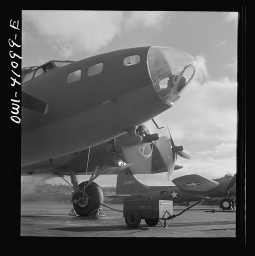Untitled photo, possibly related to: Boeing aircraft plant, Seattle, Washington. Production of B-17F (Flying Fortress) bombing planes. The bombadier's compartment in the nose