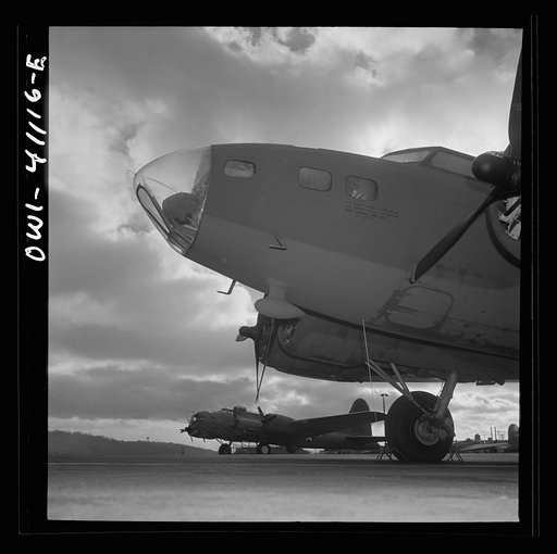 Untitled photo, possibly related to: Boeing aircraft plant, Seattle, Washington. Production of B-17F(Flying Fortress) bombing planes. Lubricating and servicing a new B-17F (Flying Fortress) bombers