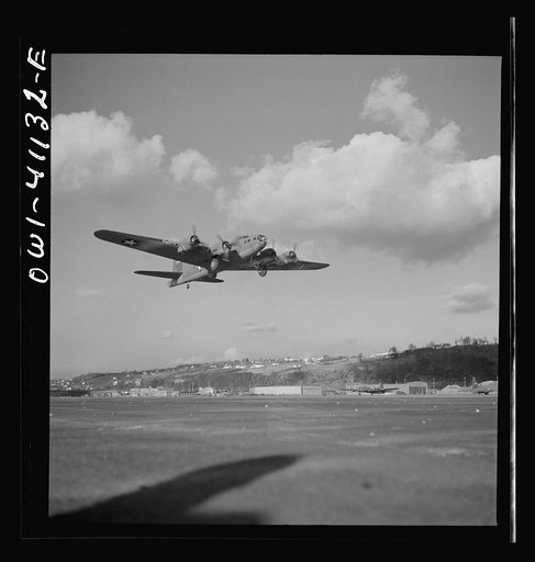 Untitled photo, possibly related to: Production. B-17 heavy bomber. Another mighty B-17F (Flying Fortress) bomber sets out on a test flight from the airfield of Boeing's Seattle plant. The Flying Fortress has performed with great credit in the South Pacific, over Germany and elsewhere. It is a four-