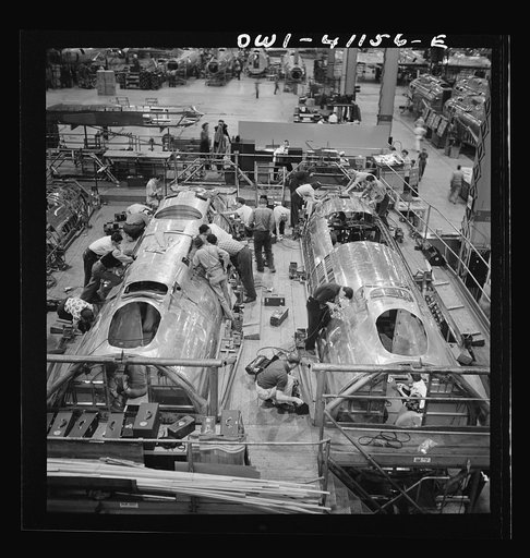 Untitled photo, possibly related to: Boeing aircraft plant, Seattle, Washington. Production of B-17F (Flying Fortress) bombing planes. Fuselage sections.