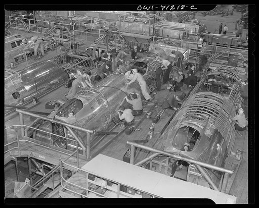 Untitled photo, possibly related to: Boeing aircraft plant, Seattle, Washington. Production of B-17F (Flying Fortress) bombing planes. Fuselage sections.