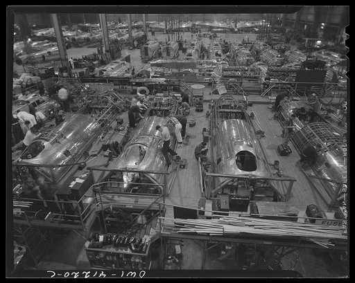 Untitled photo, possibly related to: Boeing aircraft plant, Seattle, Washington. Production of B-17F (Flying Fortress) bombing planes. Fuselage sections.